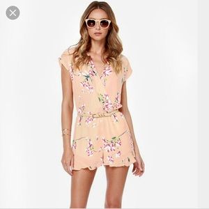 Honey punch floral romper. Never worn